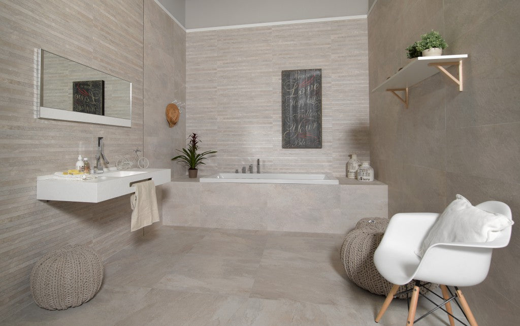 Edgartown bone stone effect matt ceramic wall tile 300x900mm in a bathroom