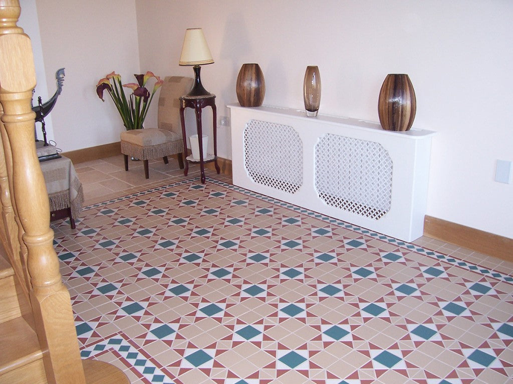 Jekyll beige Victorian pattern matt porcelain floor tile 285x285mm laid in a hallway