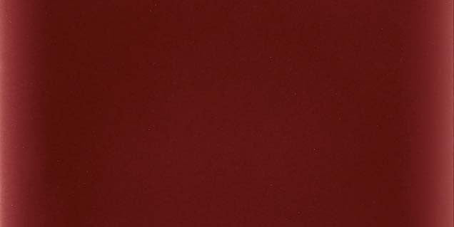 Stonington Burgundy gloss ceramic 70x140mm brick tiles on a wall