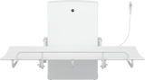 Pressalit SCT 1000 shower change table in use with safety rail