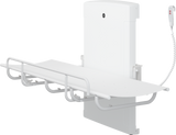 Pressalit SCT 1000 shower change table folded against the wall