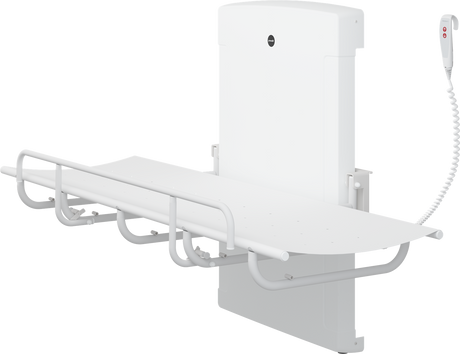Pressalit SCT 1000 shower change table folded against the wall
