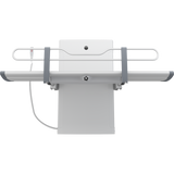 Pressalit SCT 3000 shower change table folded against the wall