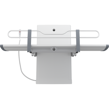 Pressalit SCT 3000 shower change table folded against the wall