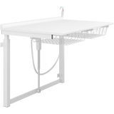 Pressalit wall-mounted daycare changing table with wire baskets