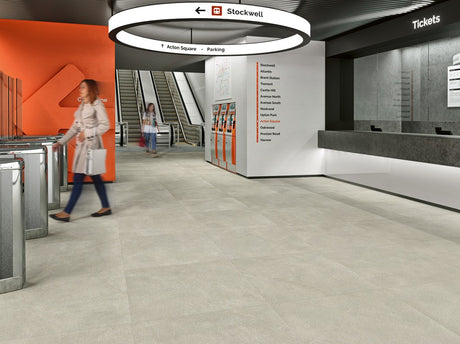Bodega light grey 900x900mm matt porcelain tile laid in a room setting