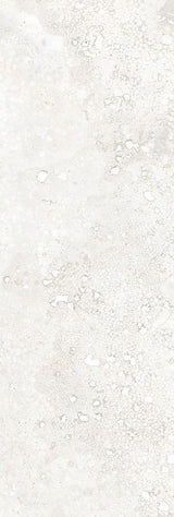 Charleston grey travertine-effect matt porcelain 100x300mm brick tile on a floor