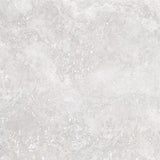 Charleston grey travertine-effect matt porcelain 1200x1200mm slab on a wall