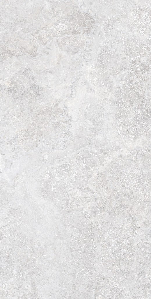Charleston grey travertine-effect matt porcelain 600x1200mm tile laid on a bathroom floor