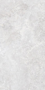Charleston grey travertine-effect matt porcelain 600x1200mm tile laid on a bathroom floor