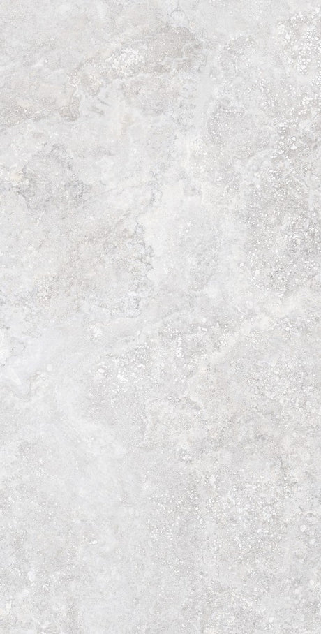 Charleston grey travertine-effect matt porcelain 600x1200mm tile laid on a bathroom floor