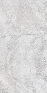 Charleston grey travertine-effect matt porcelain 600x1200mm tile on a wall