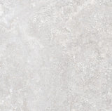 Charleston grey travertine-effect matt porcelain 600x600mm tile on a wall