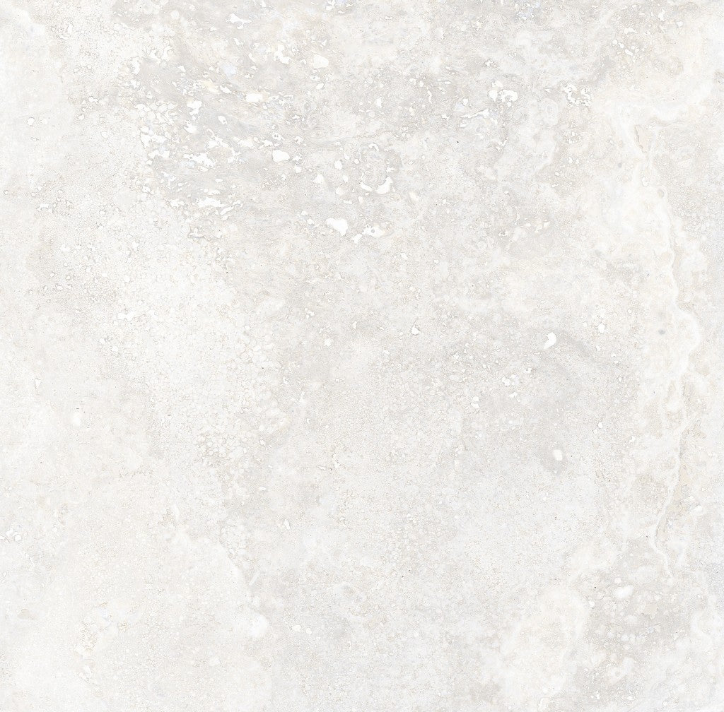 Charleston white travertine-effect matt porcelain 600x600mm tile on a bathroom wall