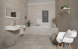 Edgartown bone stone effect matt ceramic wall tile 300x900mm in a bathroom