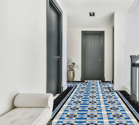 Edisto ocean blue Victorian pattern matt porcelain floor tile 338x338mm laid in a hallway