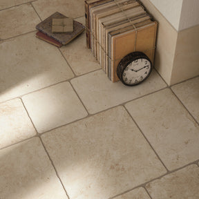 Florence ivory flagstone-effect matt porcelain wall and floor tile 300x300mm, room setting