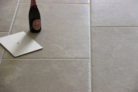 Galveston grey cement effect porcelain floor tile 600x900mm in a room setting