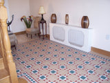 Jekyll beige Victorian pattern matt porcelain floor tile 285x285mm laid in a hallway