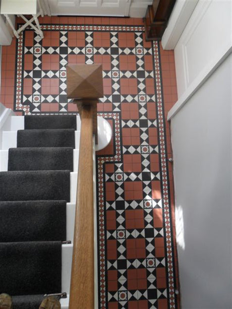 Jekyll rosette roundel Victorian inset floor tile 93x93mm set in a patterned floor
