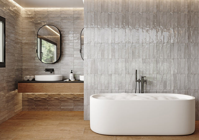 La Jolla fog grey brick effect gloss porcelain wall and floor tile 300x600mm in a room setting