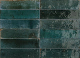 Montauk blue gloss porcelain brick tile 240x60mm on a bathroom wall