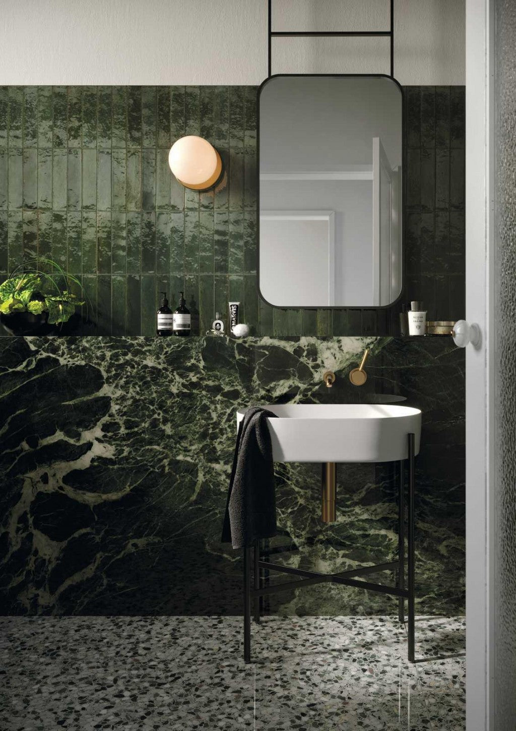 Montauk green gloss porcelain brick tile 240x60mm laid on a wall