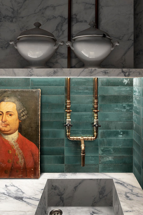 Montauk turquoise gloss porcelain brick tile 240x60mm on a wall