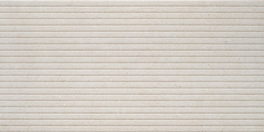Savannah light grey stone effect decor tile in a room setting