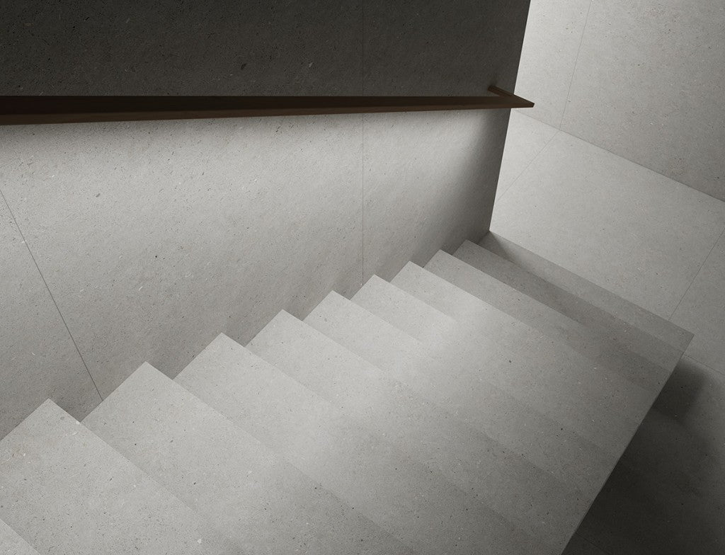 Savannah light grey matt porcelain large format tile laid on a floor