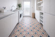Southampton beige Victorian plain matt porcelain floor tile 93x93mm laid in a hallway